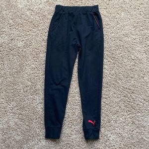 Puma, medium, black joggers with the red detailing